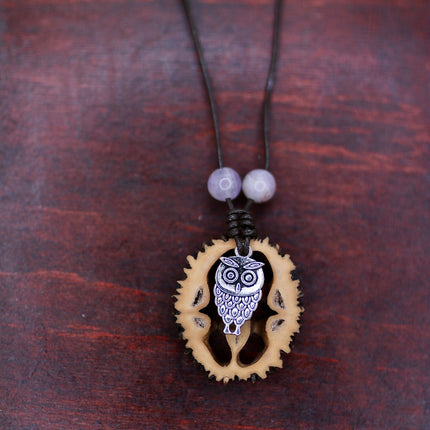 Schwarznuss Amulett – Eulenanhänger & Amethyst