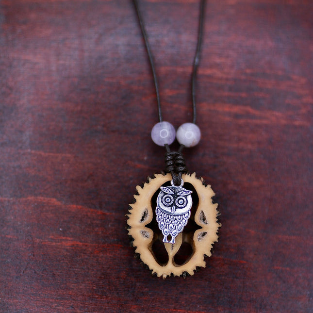 Schwarznuss Amulett – Eulenanhänger & Amethyst