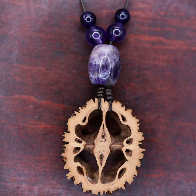 Schwarznuss Scheibe – Amethystperlen groß