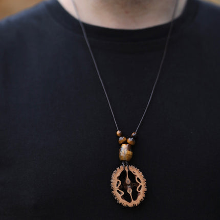 Schwarznuss Scheibe – Tigerauge groß