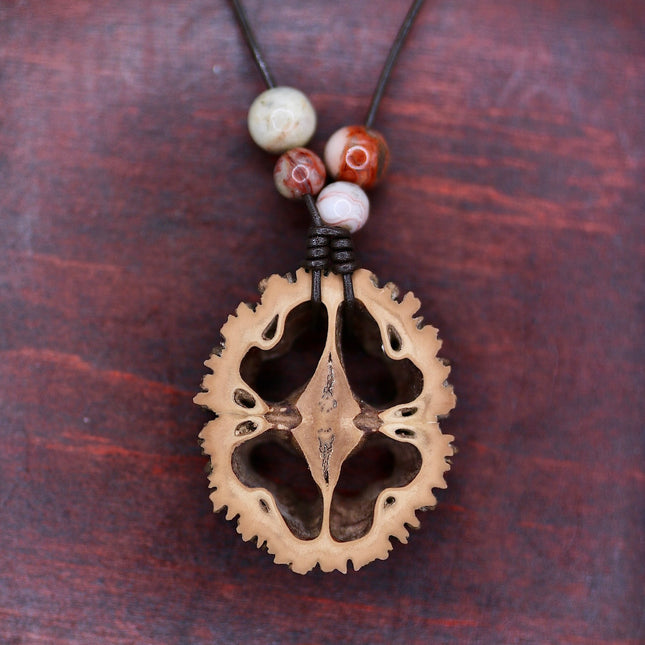 Schwarznuss Scheibe – Crazy Lace Achatperlen